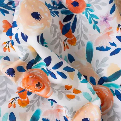 Couverture bouquet froissée, gros plan sur les grosses fleurs pêche et bleues