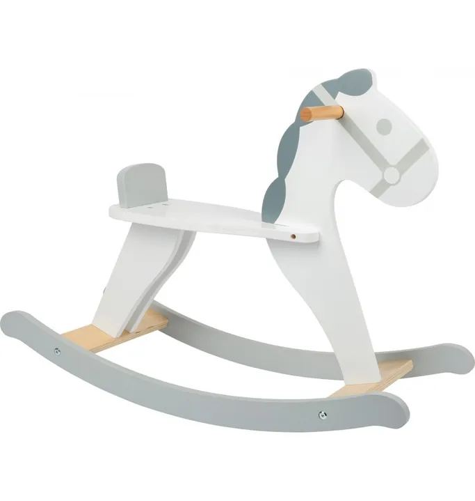 Un cheval à bascule en bois laqué blanc, avec la crinière, la selle et les patins gris