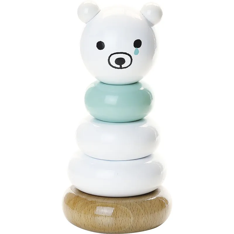 Un jouet empilable en bois en forme d'ourson blanc, avec des anneaux blancs et vert d'eau sur un socle en bois naturel