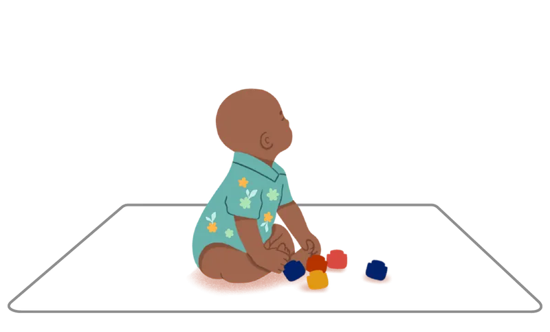 Pictogramme 1-3 ans : un enfant assis qui joue avec des balles