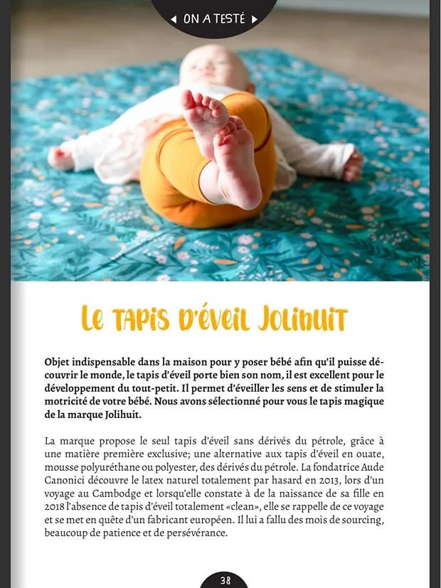 Page 38 du magazine Family Plus, rubrique On a testé : un bébé en legging orange allongé sur un tapis à fleurs turquoise, sous le titre Le tapis d'éveil Jolihuit.